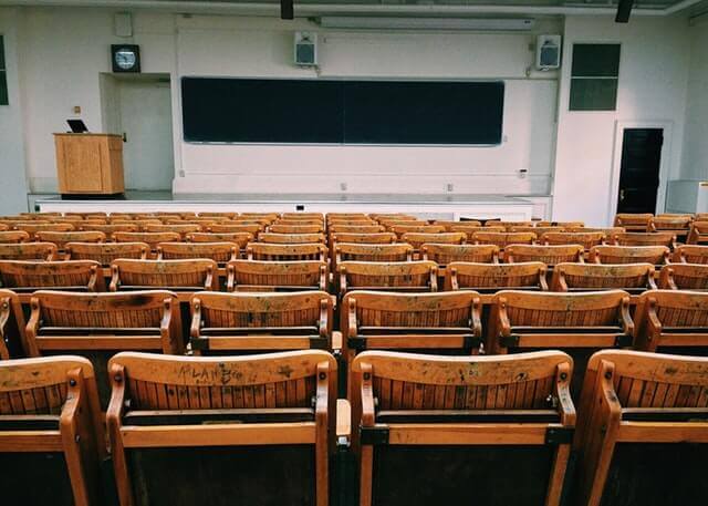 row of chairs in a school auditorium